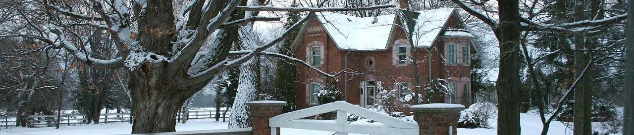 Country house blanketed in snow