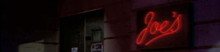 Joe's Bar exterior with neon sign in Highlander: The Series